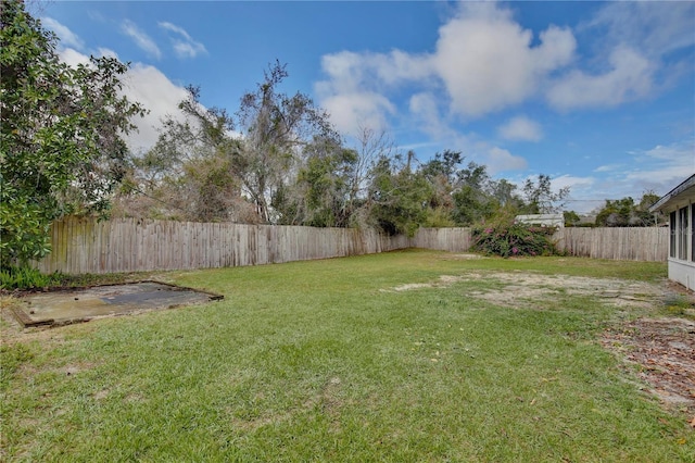 view of yard featuring a fenced backyard