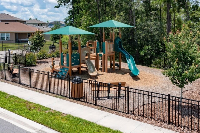 community play area featuring fence