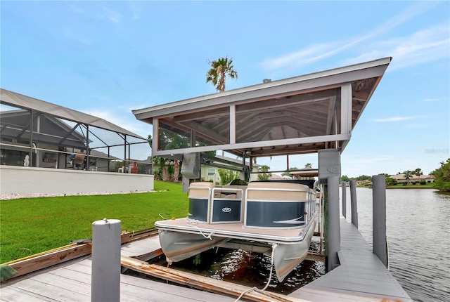 view of dock featuring a lanai, a water view, a lawn, and boat lift