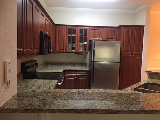 kitchen featuring a sink, appliances with stainless steel finishes, reddish brown cabinets, glass insert cabinets, and crown molding