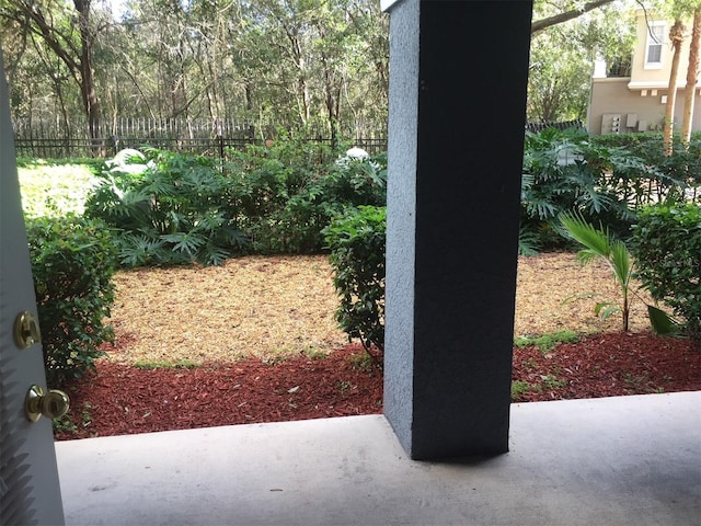 exterior space featuring a patio area and fence