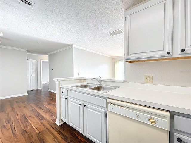 kitchen featuring light countertops, white cabinetry, dishwasher, and a sink