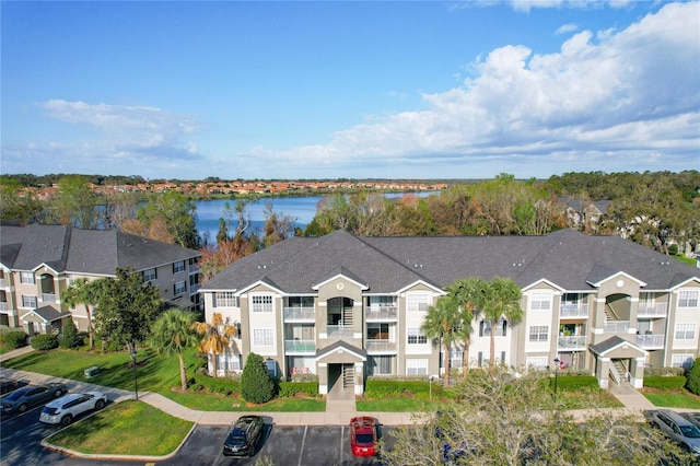 drone / aerial view with a water view