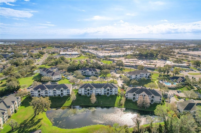 bird's eye view with a water view and a residential view