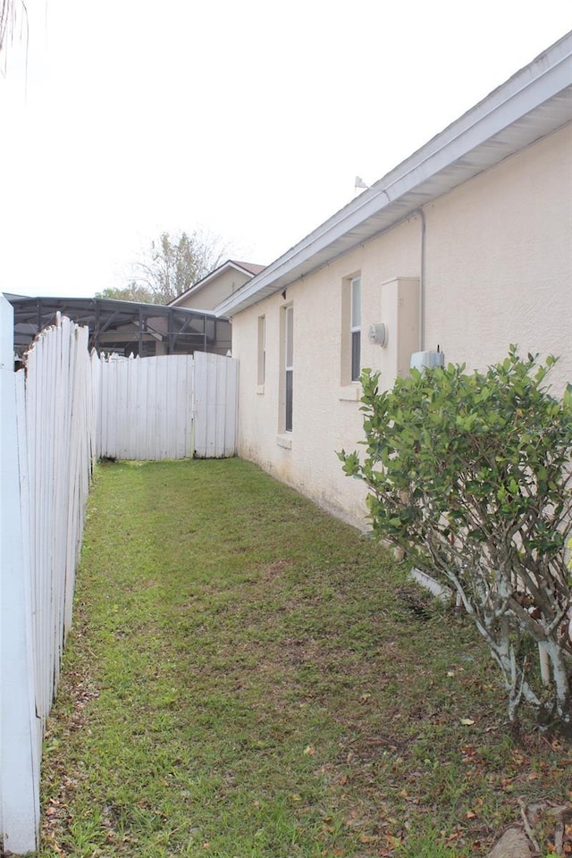 view of yard with fence