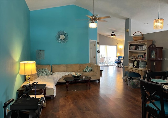 living room featuring lofted ceiling, ceiling fan, and wood finished floors