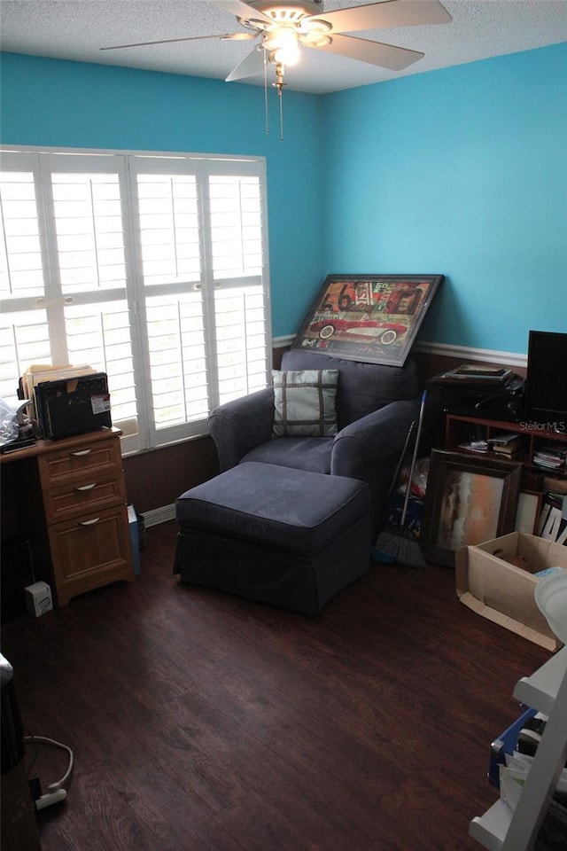 bedroom with ceiling fan and dark wood-style flooring