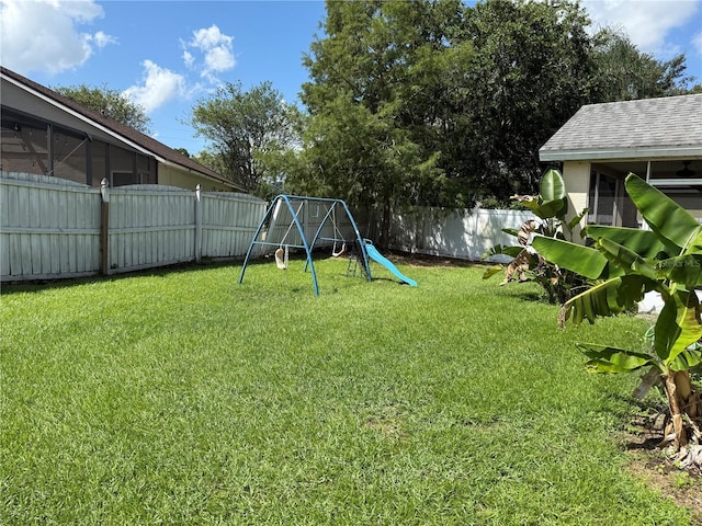 536 Dunoon St, Ocoee, FL 34761 - fenced backyard featuring a playground