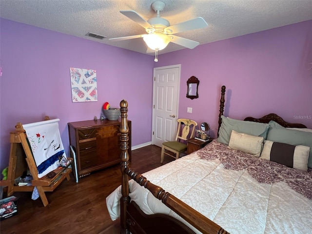 536 Dunoon St, Ocoee, FL 34761 - bedroom featuring dark wood-style floors, a textured ceiling, and ceiling fan