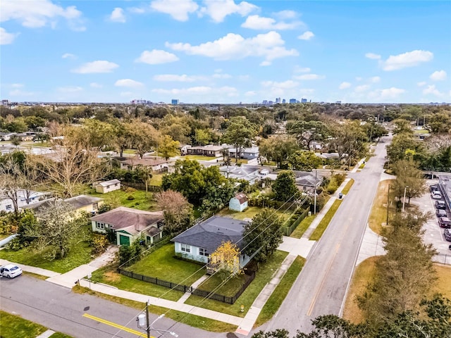 birds eye view of property with a residential view