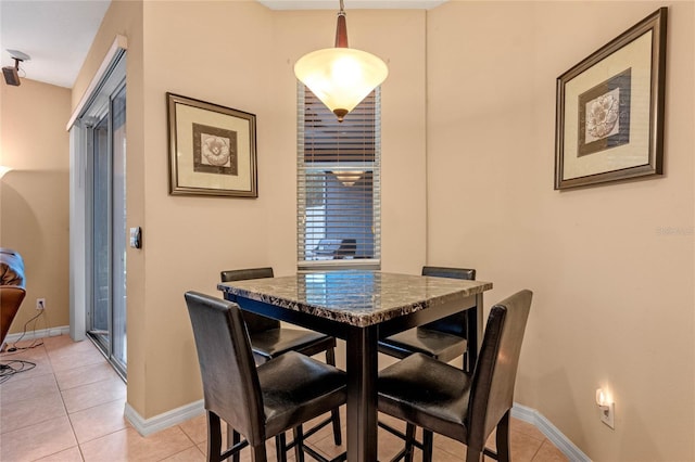 1562 Travertine Ter, Sanford, FL 32771 - dining space with baseboards and light tile patterned flooring