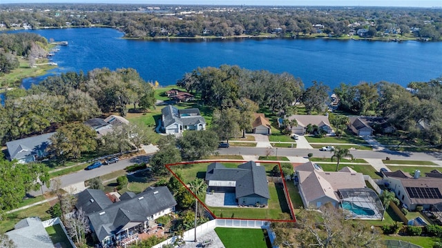 aerial view with a water view and a residential view