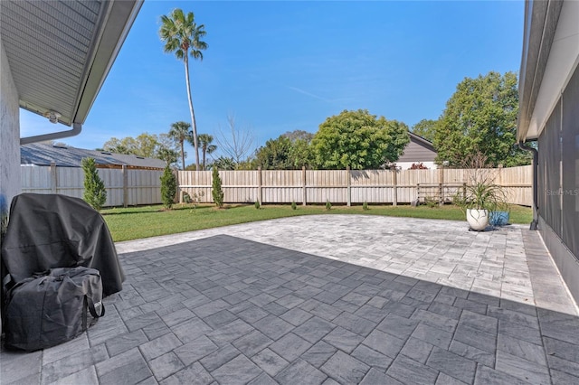 view of patio / terrace featuring area for grilling and a fenced backyard