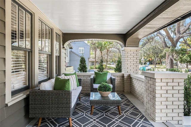 view of patio featuring a porch