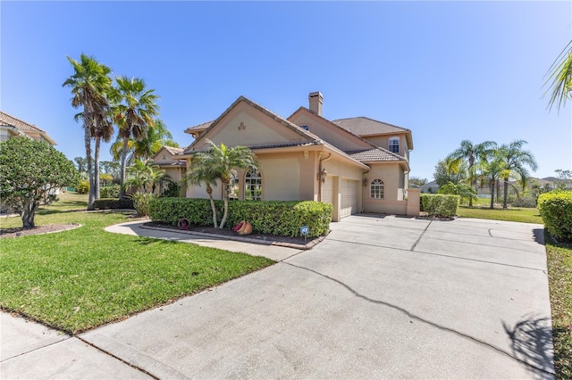 mediterranean / spanish-style house featuring a front lawn, a tiled roof, concrete driveway, stucco siding, and an attached garage