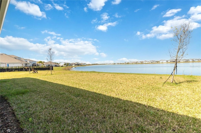 view of yard featuring a water view