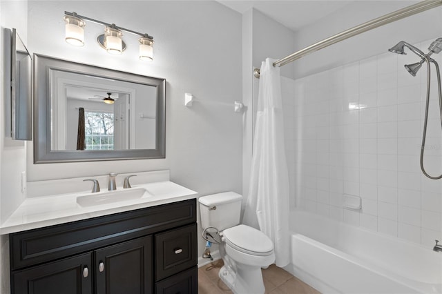 bathroom featuring tile patterned flooring, shower / tub combo with curtain, vanity, and toilet