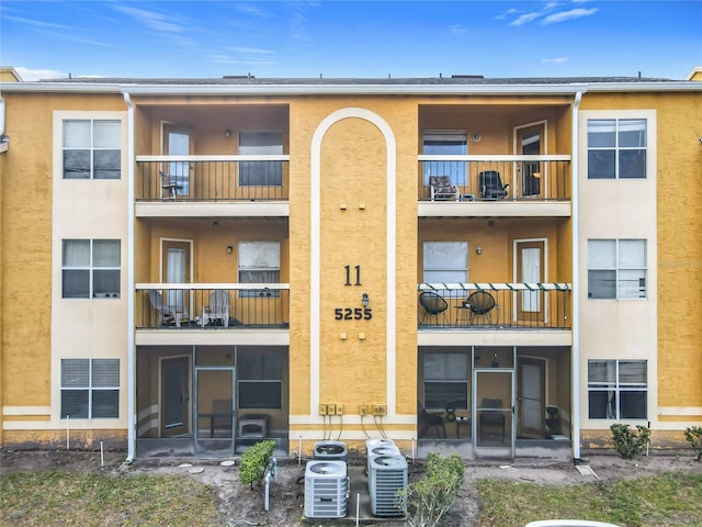 view of building exterior featuring central AC