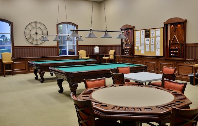 recreation room featuring a wainscoted wall, pool table, and carpet