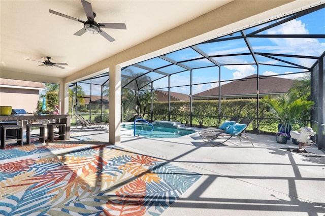 pool featuring a ceiling fan, a lanai, and a patio area