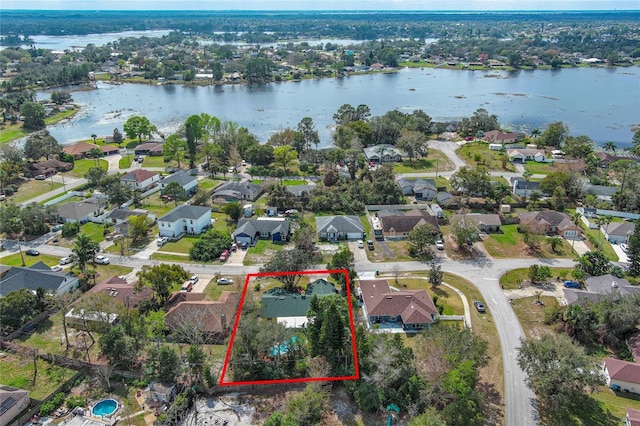 aerial view featuring a residential view and a water view