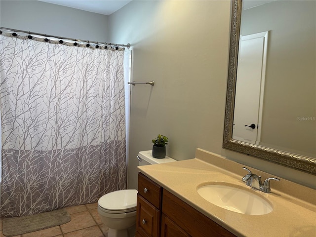 full bath featuring toilet, a shower with curtain, vanity, and tile patterned floors