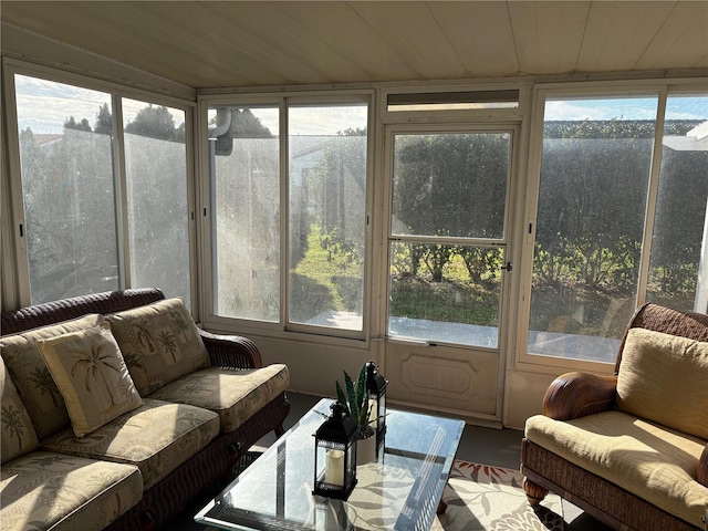 sunroom featuring wooden ceiling