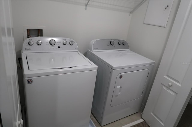 laundry room with independent washer and dryer and laundry area