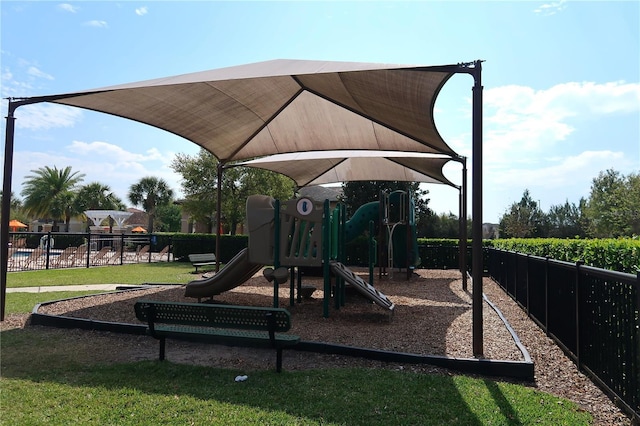 community play area featuring fence
