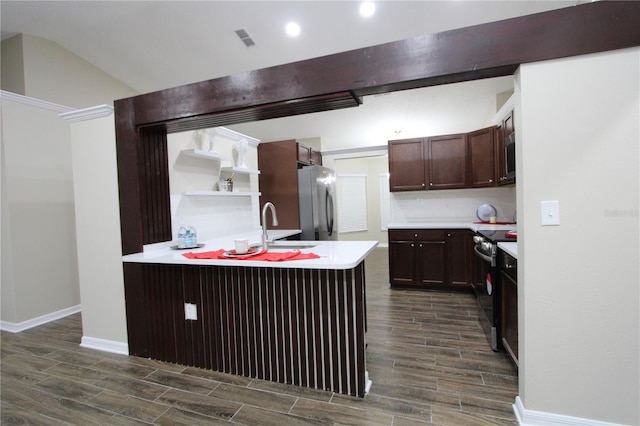 kitchen with dark brown cabinetry, a sink, visible vents, appliances with stainless steel finishes, and wood tiled floor