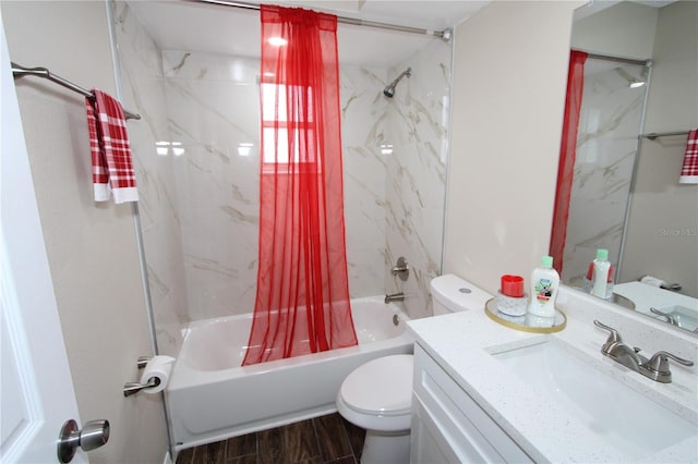 bathroom with toilet, shower / bath combo with shower curtain, wood finished floors, and vanity