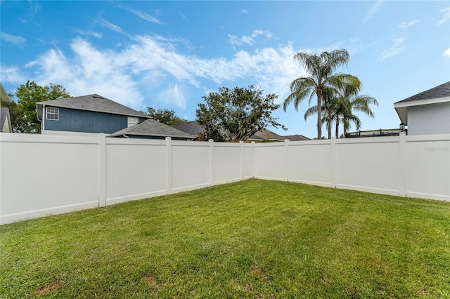 3320 Ashmount Dr, Orlando, FL 32828 - view of yard featuring a fenced backyard