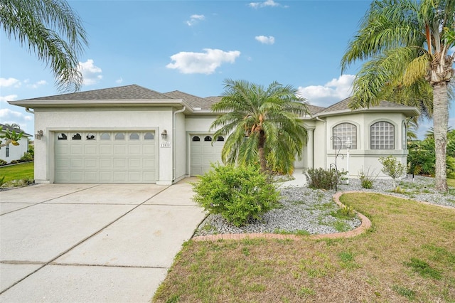 12018 SE 175th Loop, Summerfield, FL 34491 - ranch-style home with an attached garage, stucco siding, concrete driveway, and a front lawn