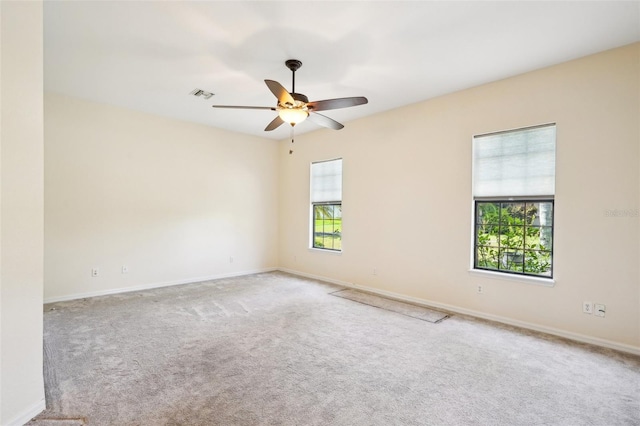 12018 SE 175th Loop, Summerfield, FL 34491 - unfurnished room with carpet flooring, baseboards, and ceiling fan