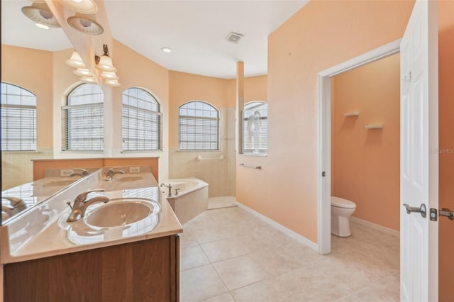 12018 SE 175th Loop, Summerfield, FL 34491 - bathroom featuring double vanity, a garden tub, tile patterned flooring, toilet, and walk in shower
