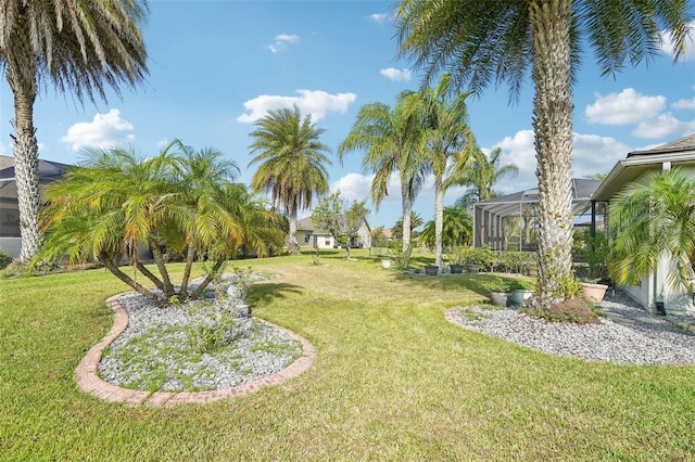 12018 SE 175th Loop, Summerfield, FL 34491 - view of grassy yard with glass enclosure