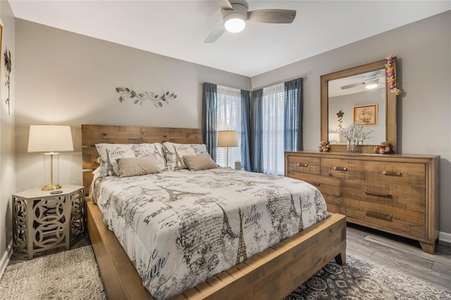 bedroom featuring a ceiling fan and light wood-style floors