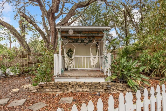 view of outdoor structure featuring a fenced backyard