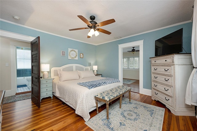 bedroom with wood finished floors, a ceiling fan, visible vents, baseboards, and ornamental molding