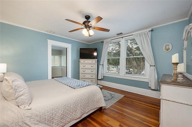 bedroom featuring crown molding, multiple windows, baseboards, and dark wood-type flooring