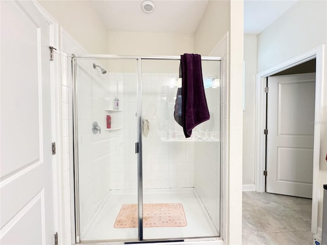 full bathroom with a shower stall