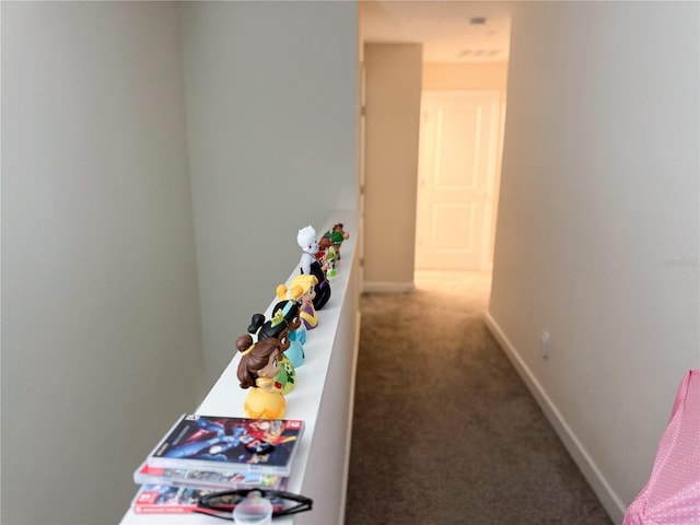 playroom with carpet flooring and baseboards