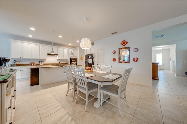 dining area with recessed lighting, visible vents, baseboards, and light tile patterned floors