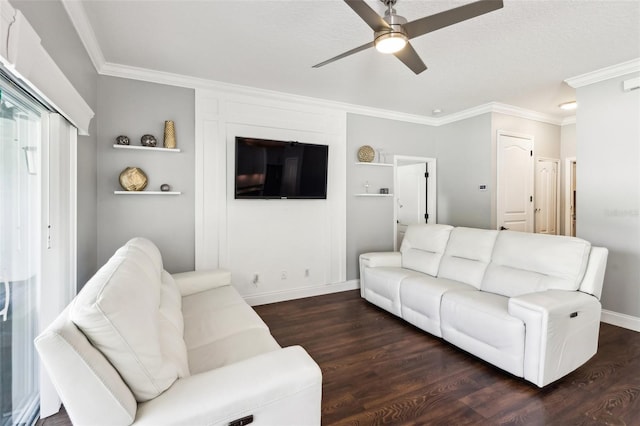 living room with baseboards, dark wood finished floors, and crown molding