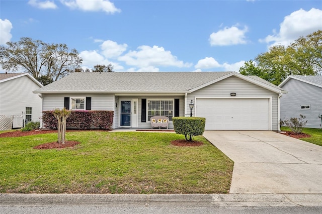 single story home featuring a garage, concrete driveway, and a front lawn