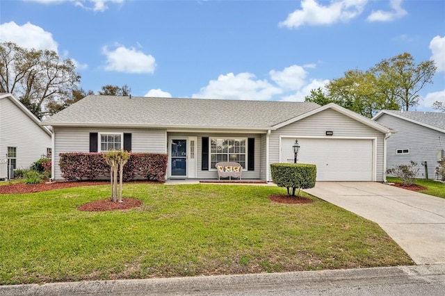 ranch-style home with a garage, roof with shingles, concrete driveway, and a front yard