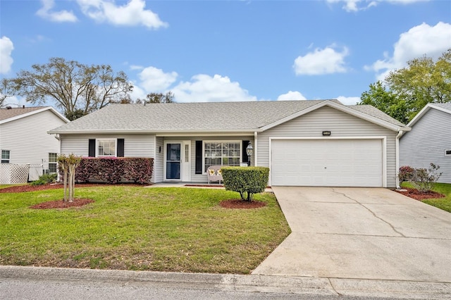 ranch-style home featuring concrete driveway, roof with shingles, an attached garage, and a front lawn