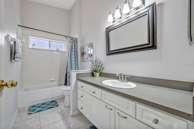 bathroom featuring baseboards, toilet, tile patterned flooring, shower / bath combination with curtain, and vanity