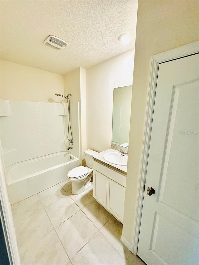 bathroom with visible vents, toilet,  shower combination, a textured ceiling, and vanity