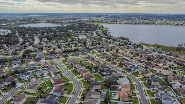 aerial view featuring a water view and a residential view